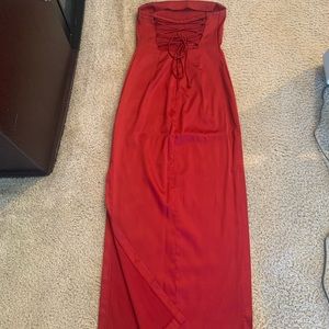 Beautiful satin dress. Slits on both sides up to the knee.